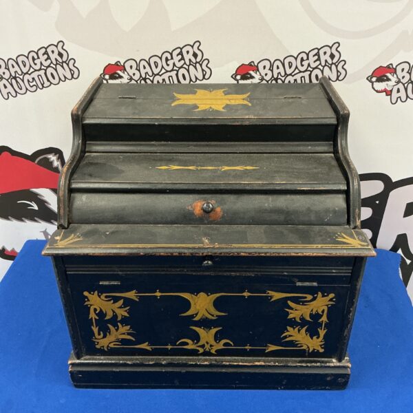 Front view of a vintage lacquered stationary cabinet.