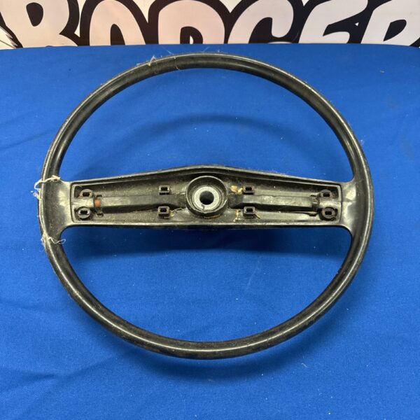 Vintage steering wheel centre with a one inch bore for classic cars.