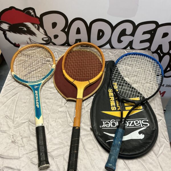 Vintage Dunlop Maxply tennis racket, wooden frame, classic sports equipment.