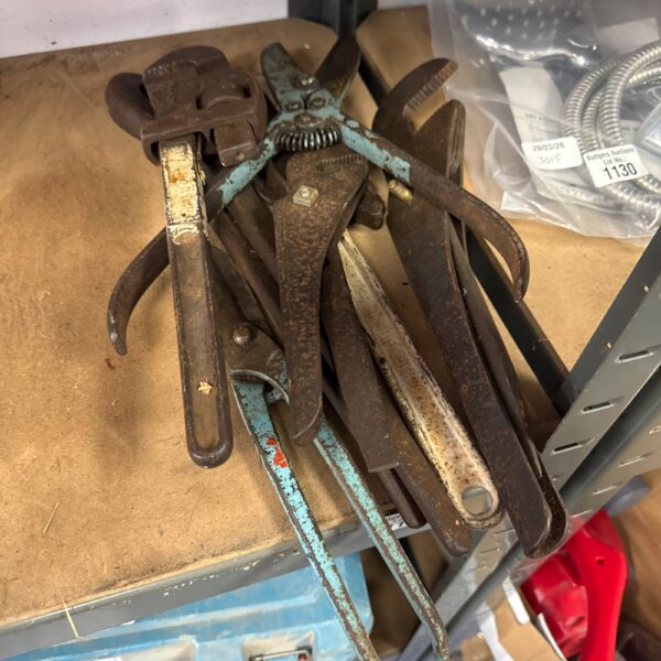 Vintage lot of tin snips and grips for metalworking.