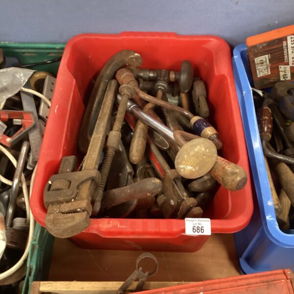 Vintage tool lot with wrenches and a hand drill for collectors.