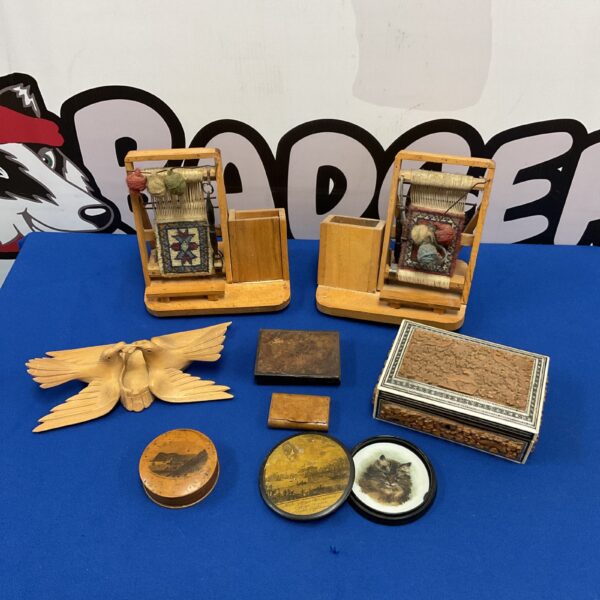 Vintage trinket box collection with miniature painting and train items.