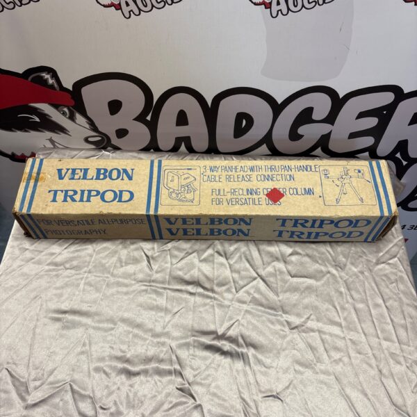 Vintage Velbon tripod in original box, classic camera support.