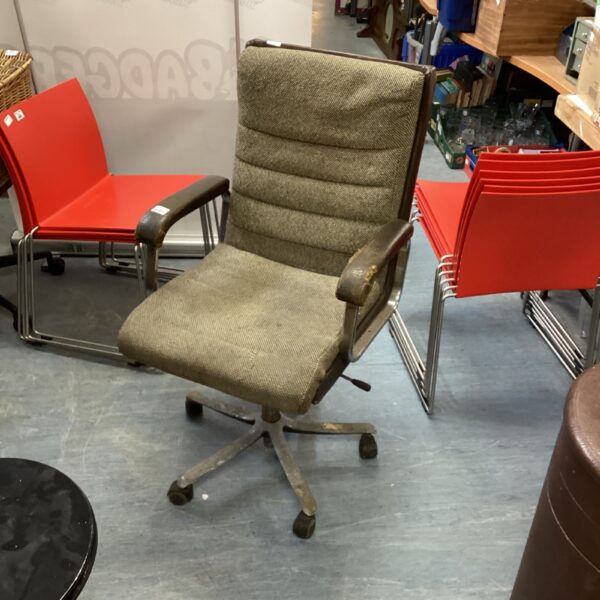 Vintage Verco office chair with textured fabric and chrome base.