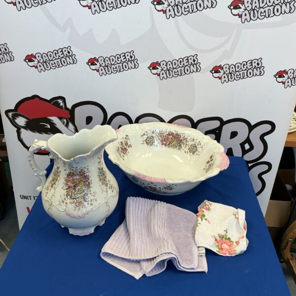 Vintage floral porcelain wash bowl and jug set, antique bathroom accessory.