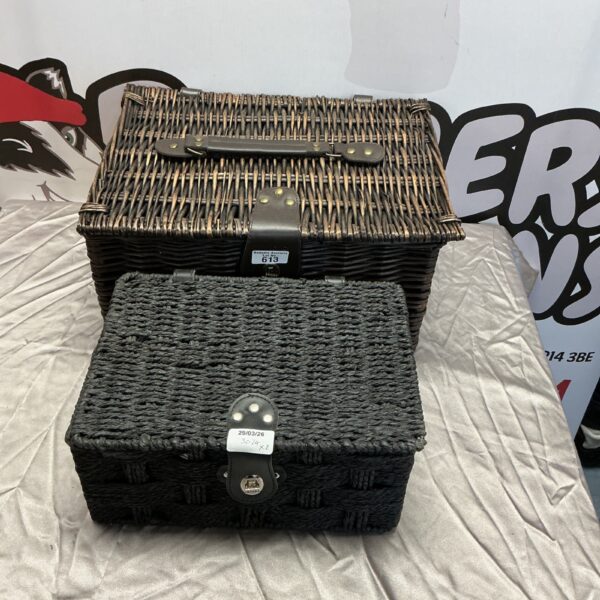 Pair of vintage wicker baskets for storage and display.