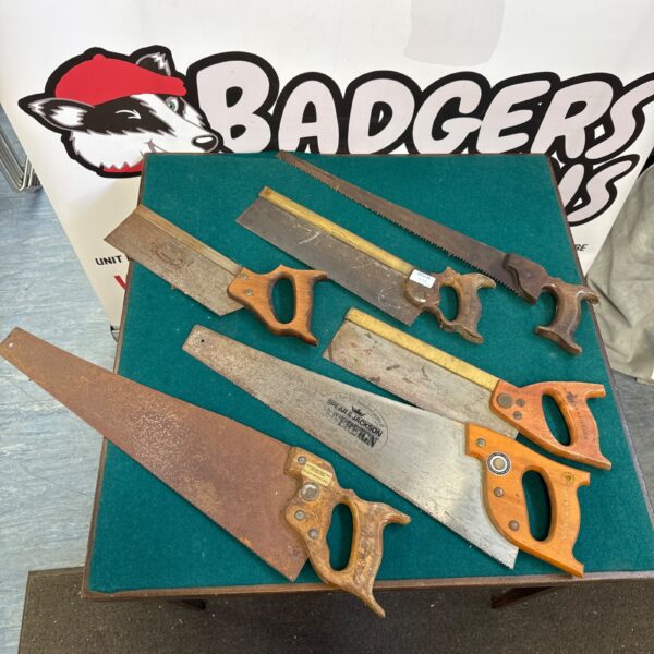 Vintage Spear & Jackson wood saws in used condition.
