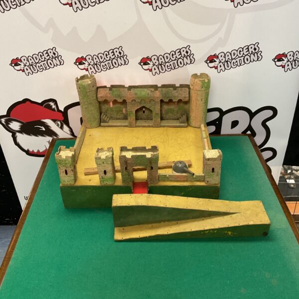 Vintage wooden fort diorama, a charming collectible toy.