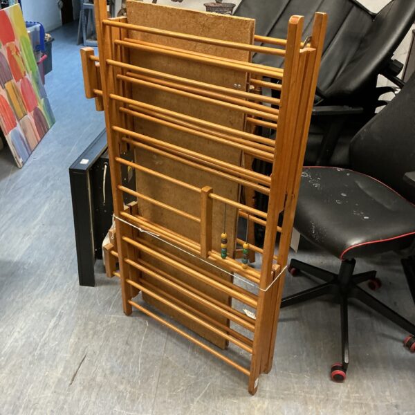 Vintage wooden playpen in as-found condition, ideal for collectors.