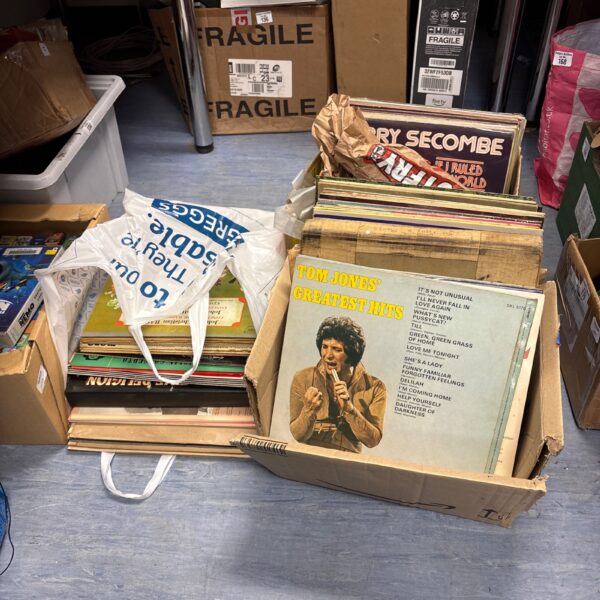Mixed vinyl record bundle featuring Tom Jones and Jackie Genova LPs.