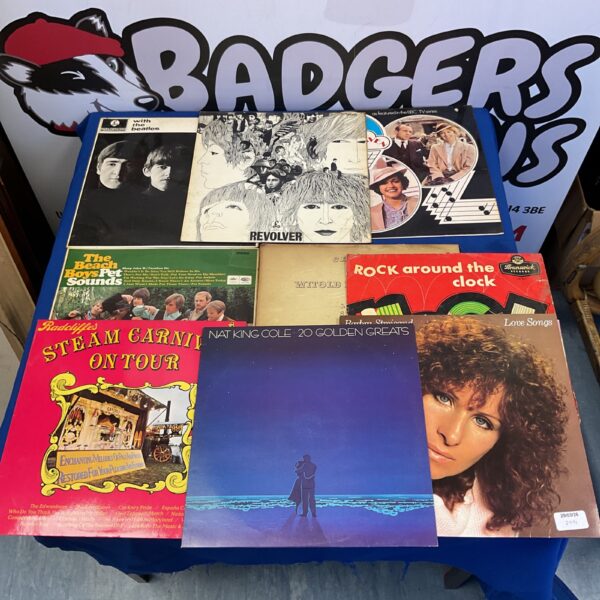 Vintage vinyl record collection with colourful album covers.