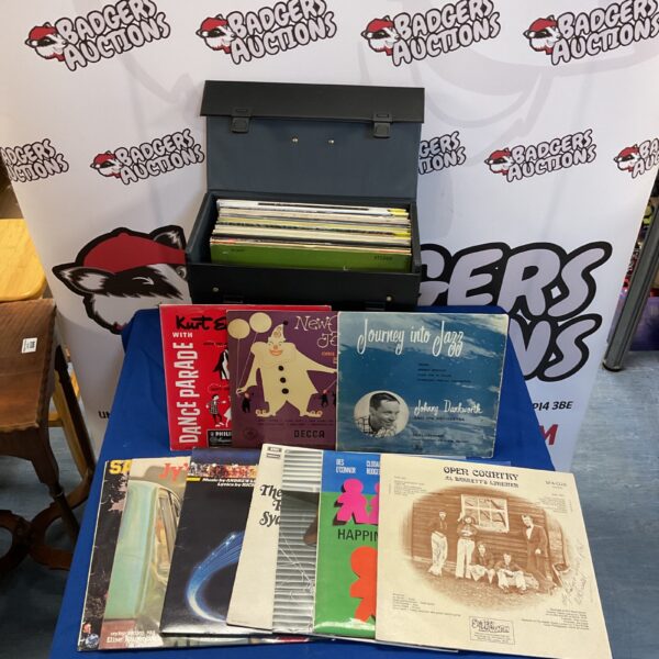 Vintage vinyl record collection with signed "Open Country" LP.