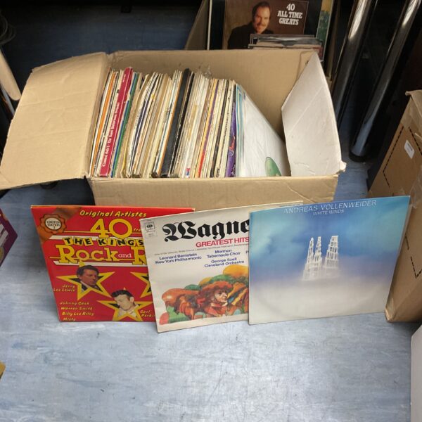 Assortment of vintage vinyl records in a lot.