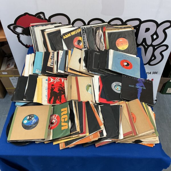 Vintage vinyl record lot including Dire Straits singles.