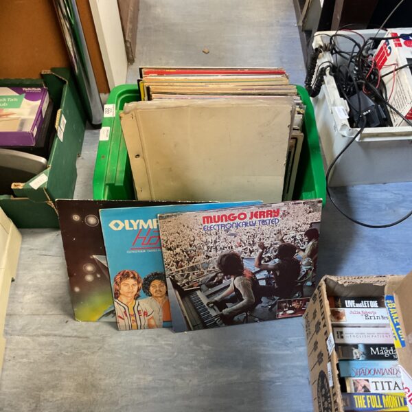 Mixed genre vinyl record lot with various album covers.