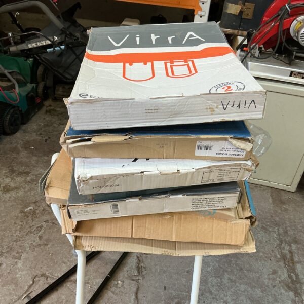 Job lot of boxed Vitra toilet seats for bathroom renovations.