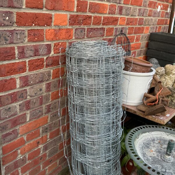 Roll of weld mesh fencing for garden and construction projects.
