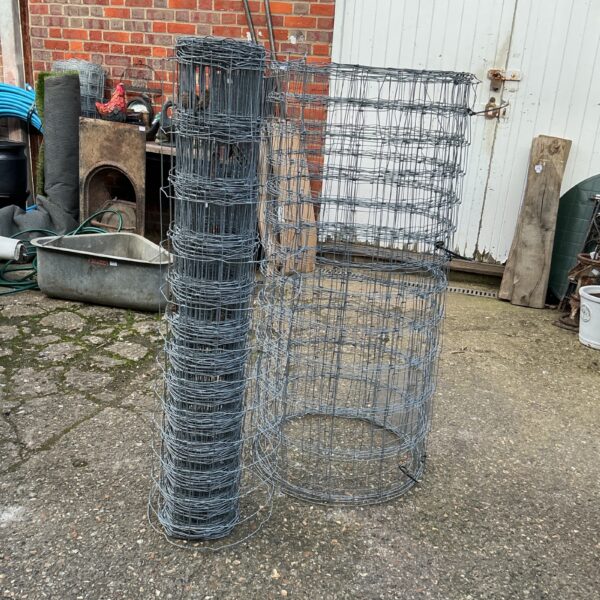 Two rolls of weld mesh fencing for garden use.