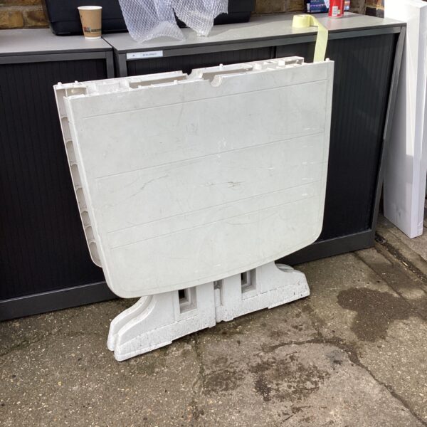 Large white plastic folding garden table for outdoor use.