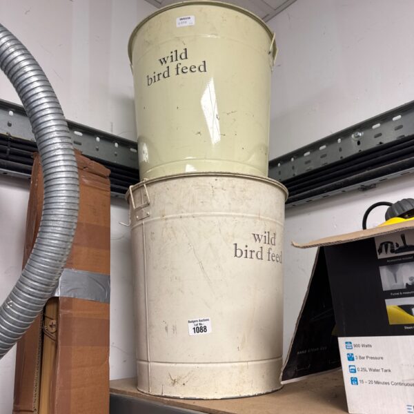 Metal wild bird feed bin for garden use.