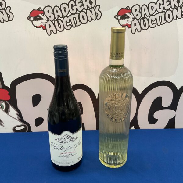 Sealed bottles of Ultimate Provence Rosé and Washington State Merlot wine.