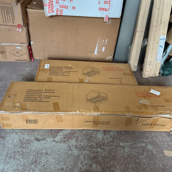 Wooden cabin bed packaging showing wear and tear.
