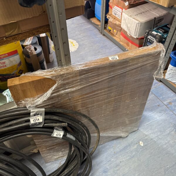 Close-up of a solid wood worktop section for DIY projects.
