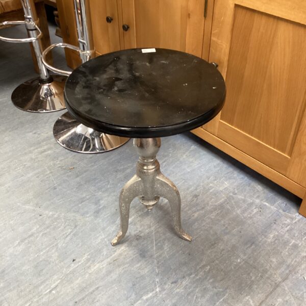 Vintage wrought iron garden side table with scrolled feet.