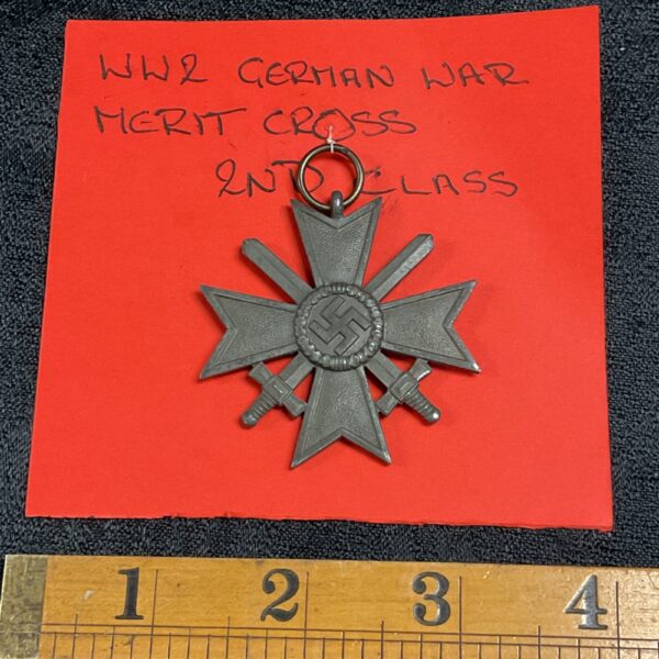 Front view of a WWII German War Merit Cross medal.