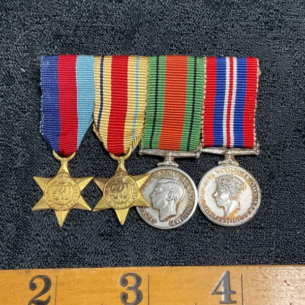 Front view of a WWII miniature medal set, including the 1939-45 Star.