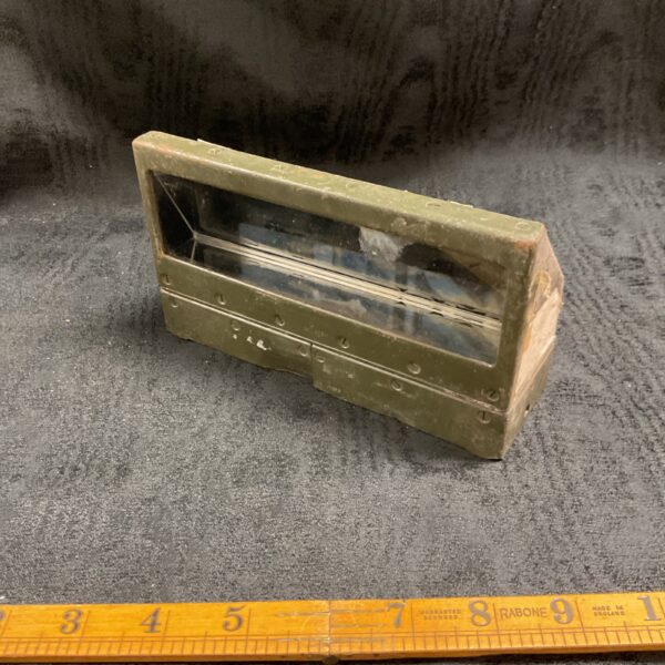 Vintage WW2 tank periscope with multiple lenses and prisms.
