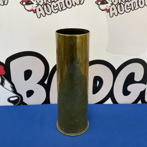 Front view of antique WWI brass shell casing from 1917.