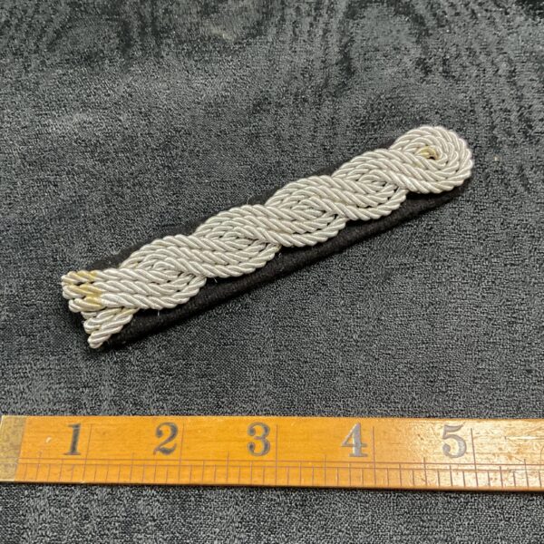 WWII German SS officer shoulder board with silver braiding.
