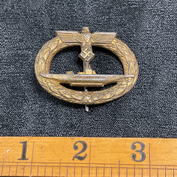 WWII Kriegsmarine U-boat badge, detailed German naval collectible.