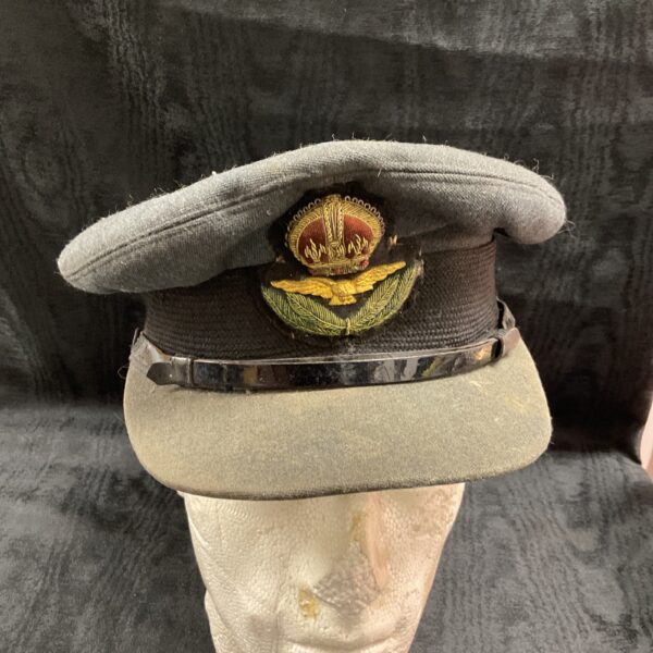WWII R.A.F. officer’s cap front view, vintage military headwear.
