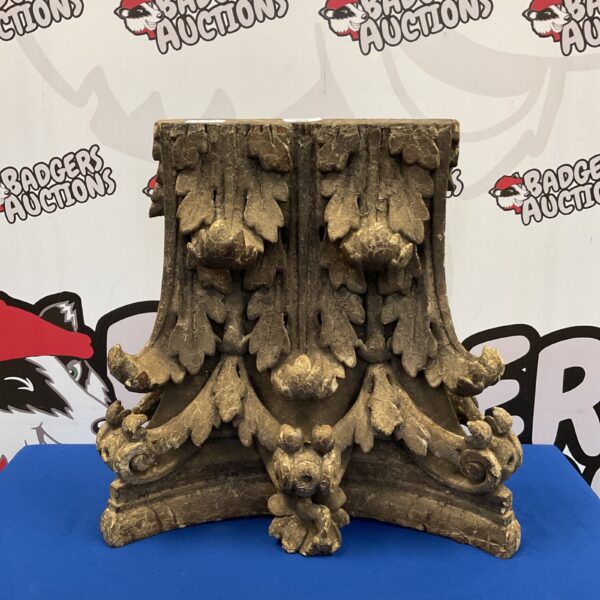 Antique 18th-century carved wooden column capital with acanthus leaves.