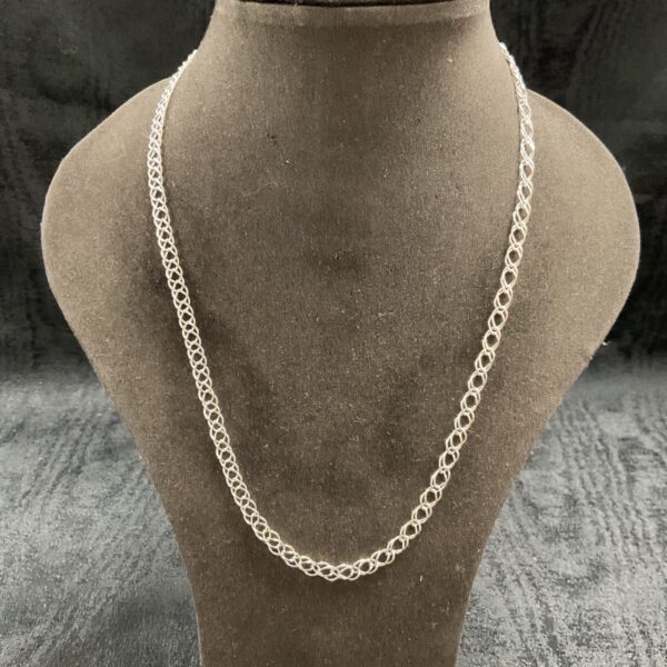 Delicate 925 silver double link chain necklace on display.