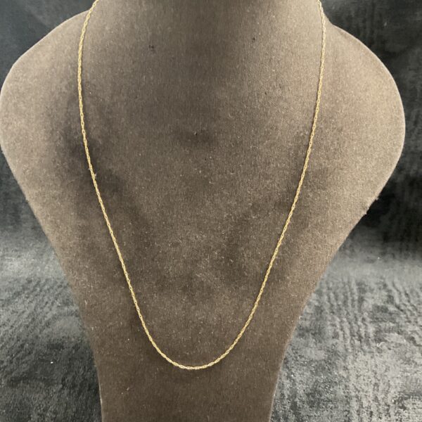 Delicate 9ct gold necklace with a fine chain design.