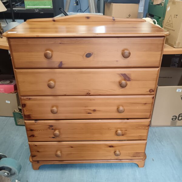 Pine five drawer chest of drawers