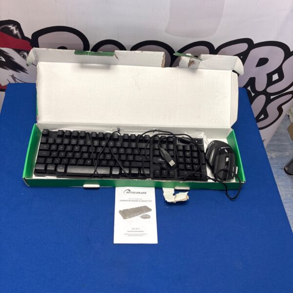 Accelerate light up gaming keyboard and mouse set in box.