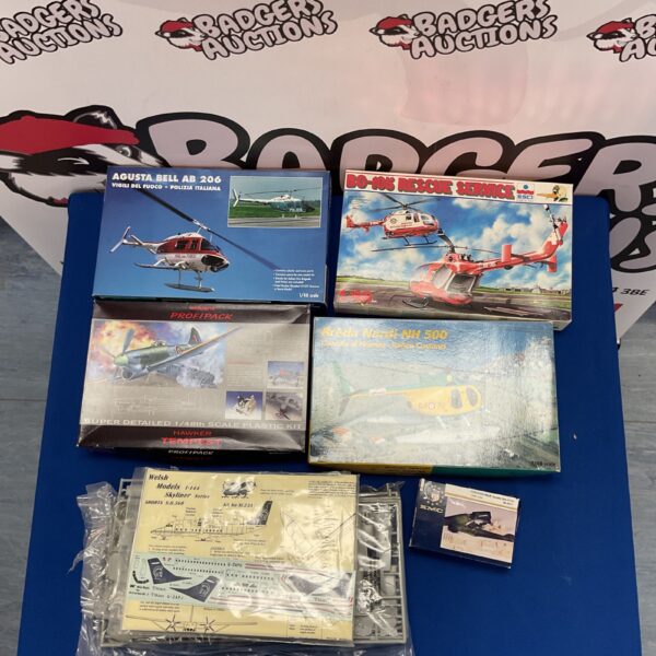 Vintage Agusta Bell AB 206 helicopter model kit with original packaging.