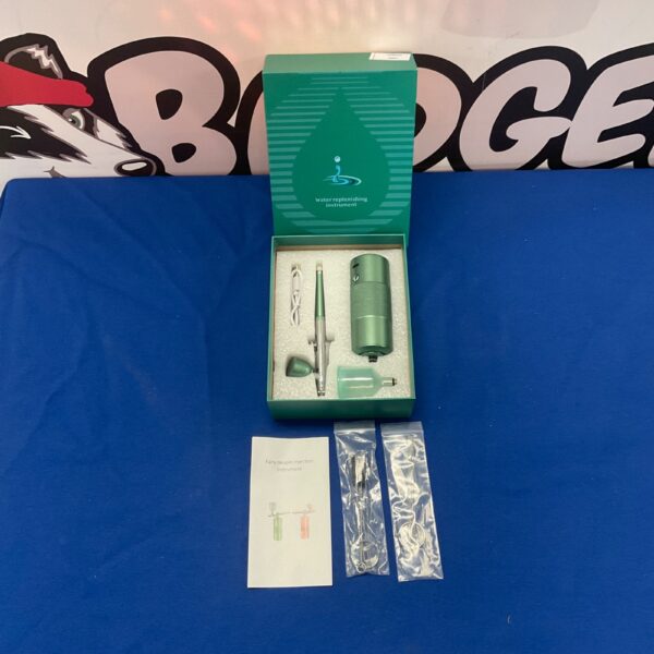 White airbrush oxygen injector for cosmetic treatments.