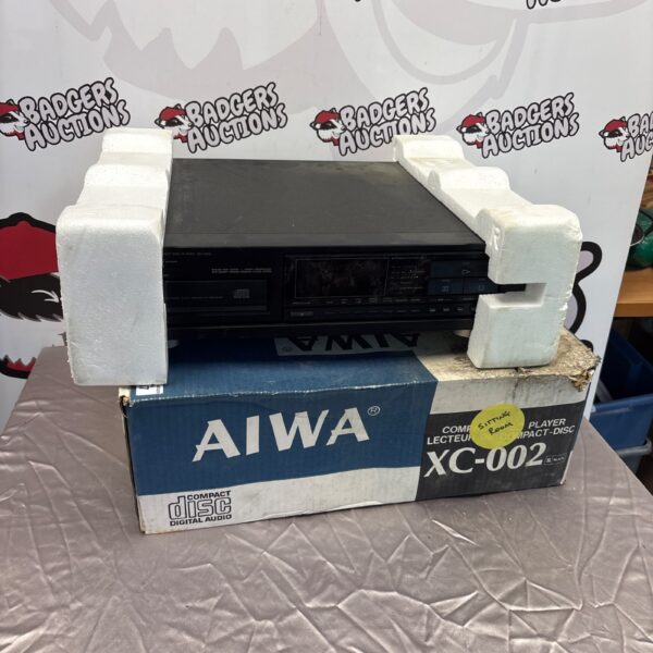 Vintage Aiwa XC-002 compact disc player in its original box.