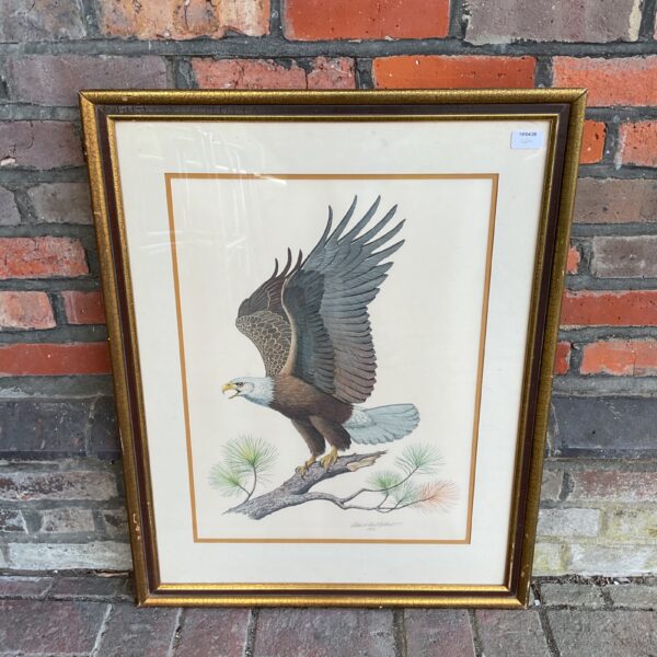 Signed Albert Earl Gilbert bald eagle print on a branch.