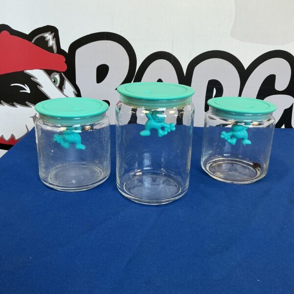 Turquoise Alessi Gianni storage jars for kitchen organisation.