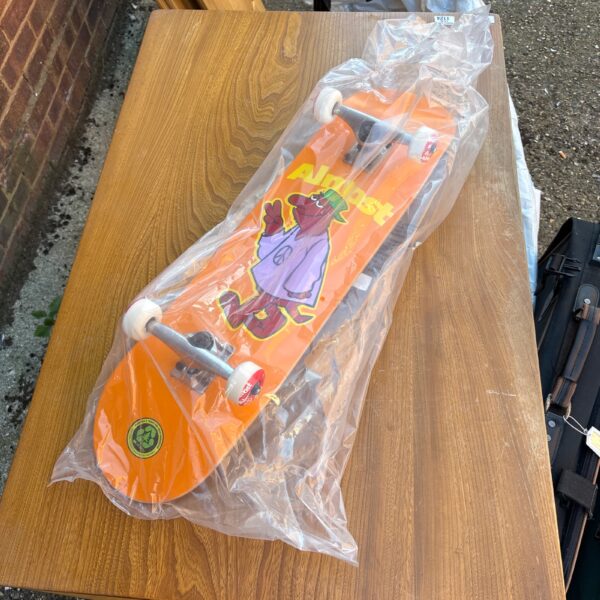New Almost Peace Out FP skateboard with Tensor trucks sealed in plastic.