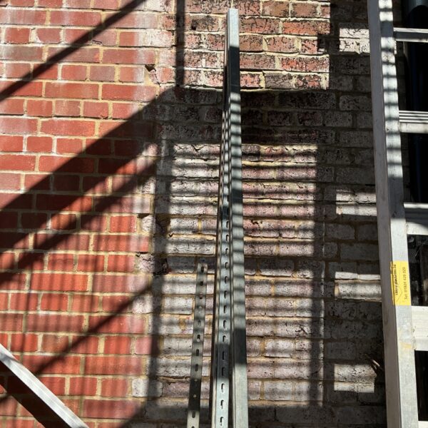 Length of aluminium cable track for wiring management.