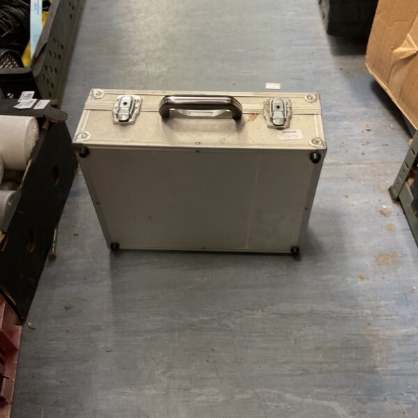 Silver aluminium flight case with handle and locking clasps.