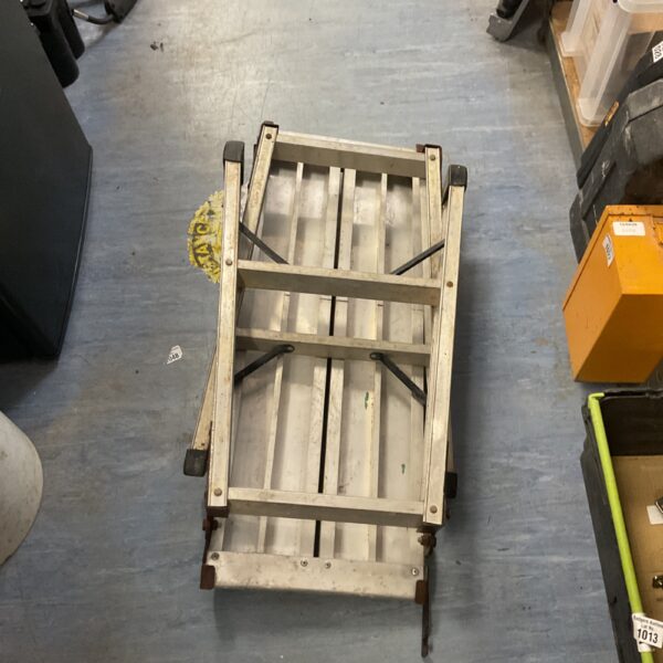 Aluminium folding work platform for elevated access and DIY projects.