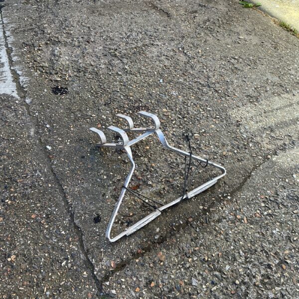 Aluminium ladder standoff for roof work and safety.
